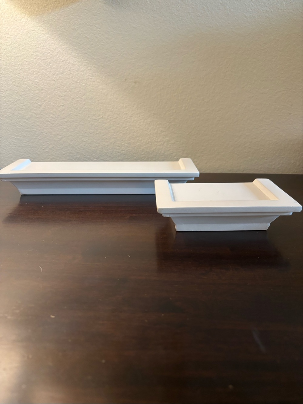 Set of 2 white matching wall shelves